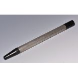 An early 20th century silver propelling pencil, of unusually large proportions, engine turned,