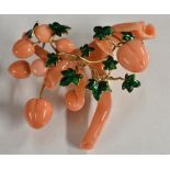 A carve pink coral enamelled fruiting vine brooch, multi layer pink coral fruit and vines,