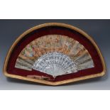 A 19th century French fan, with mother-of-pearl sticks,