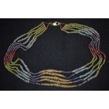 A five stand multi gemstone bead necklace,