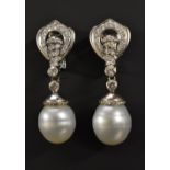 A pair of diamond and pearl droplet earrings,