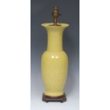 A Chinese monochrome yen yen vase, tall flared neck, incised with a a broad band of lotus,