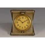 A George V silver rounded square travelling timepiece, 4.