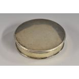 A George III silver coloured metal circular patch box, quite plain, push-fitting cover, 4.