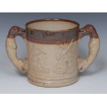 A 19th century Denby salt glazed stoneware loving cup, in relief with George and Dragon,