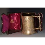 A Victorian Aesthetic Movement silver spreading cylindrical mug,