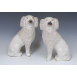 A pair of 19th century Staffordshire mantel dogs,