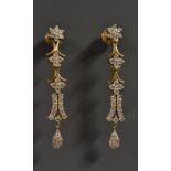 A pair of diamond drop earrings,