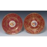 A pair of Royal Worcester circular plates, painted by P Stanley, signed, with peaches,