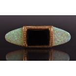 A black onyx, diamond and opaline brooch, central black onyx panel with diamond accented frame,