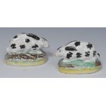 A pair of 19th century Staffordshire rabbits, black markings,