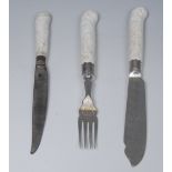 A set of Bow fish knives and forks, the blanc de chine hafts moulded wioth scrolls, c.