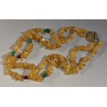 A citrine, ruby and emerald river washed pebble two strand necklace,