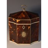 A George III tortoiseshell tea caddy, of rectangular form, with re-entrant angles,
