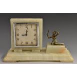 An Art Deco white onyx desk timepiece, retailed by J.C. Vickers, Regent Street, London, 6.