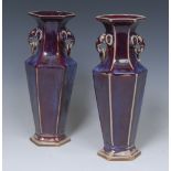 A pair of Chinese stoneware flambé hexagonal inverted baluster vases,