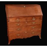 A George III chest, fall front enclosing pigeon holes c.