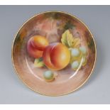 A Royal Worcester pin dish, signed, with ripe fruit on a mossy ground, 11cm diam,