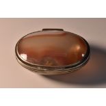 An 18th century silver-mounted agate oval snuff or spice box, quite plain, domed hinged cover,