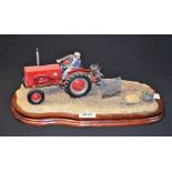 A Border Fine Arts tractor group, Lifting The Pinks, B0219, wooden plinth base, approx.