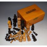 A boxwood and hardwood French Regency pattern chess set, the Kings 8cm high,