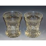 A pair of late 19th century clear glass waisted cylindrical The Last Drop tumblers,