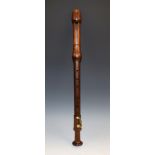 An early 19th century three-piece rosewood tenor recorder,