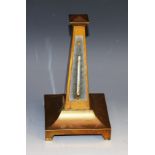 A 19th century cast brass obelisk desk thermometer, silvered register, bracket feet, 18.5cm high, c.