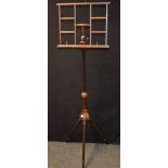 A 19th century Wheeldon's patent adjustable duet music stand, trellis plateaux, tripod base, 149.