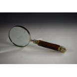 A connoiseur's lens, the magnifying glass with associated stag antler haft,