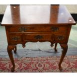 A reproduction lowboy, burr walnut finish, Queen Anne style, oversailing top, 75cm x 46cm approx.