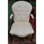 A George III French Hepplewhite mahogany elbow chair, deep-buttoned stuffed-over damask upholstery,