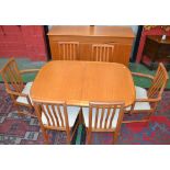 A Skovby teak dining room suite, comprising sideboard, extending dining table,