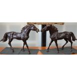 A pair of bronzed metal models Trotting Horses,