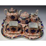 Ceramics - a 19th century Imari palette tea for two comprising teapot, cream jug, sucrier,