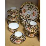 A Royal Crown Derby 2451 pattern Imari tea set for six, sugar bowl, circular bread and butter plate,