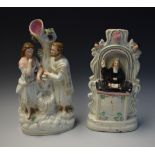 A 19th century Staffordshire clock figure group, of John Wesley preaching from the pulpit,
