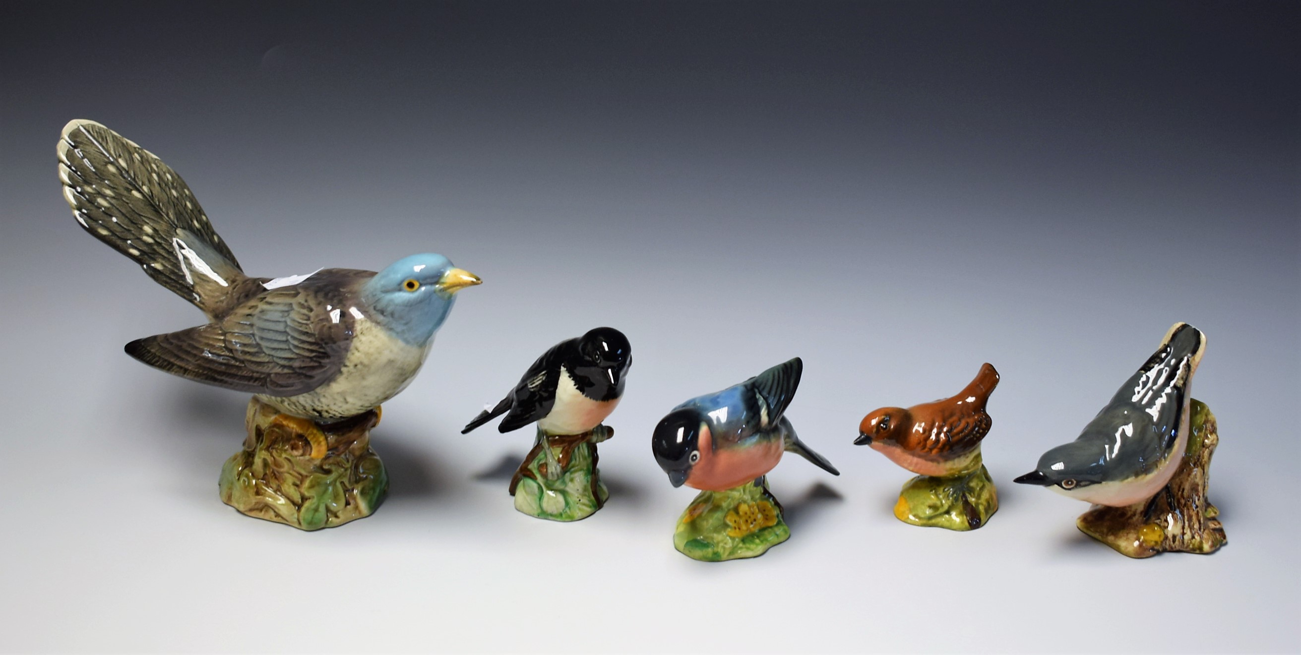 A Beswick ceramic model, Pigeon 2315; others, Nuthatch, Stonechat, Wren,