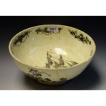 A Liverpool Herculaneum creamware circular bowl, printed in monochrome with a Man of War,