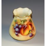 A Royal Worcester vase, painted by Roberts, signed, with peaches and grapes on a mossy ground,