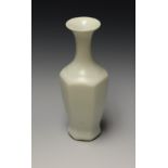A Chinese longquan type celadon porcelain panelled ovoid vase, flared rim, 16cm high,