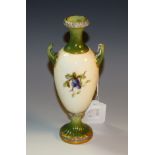 A Royal Worcester two handled pedestal ovoid two-handled vase, printed and painted with fruit swags,
