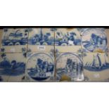 Eight Dutch Delft tiles, decorated in blue, stylised dragonfly, village church, swan,