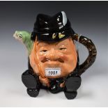 An early 20th century Staffordshire pottery novelty character teapot, as a fisherman,