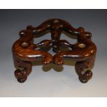 A 19th century Chinese hardwood trefoil-shaped tripod censer stand, triple-gourd centre,