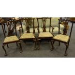 A set of four Hepplewhite Revival mahogany dining chairs, including two carvers,