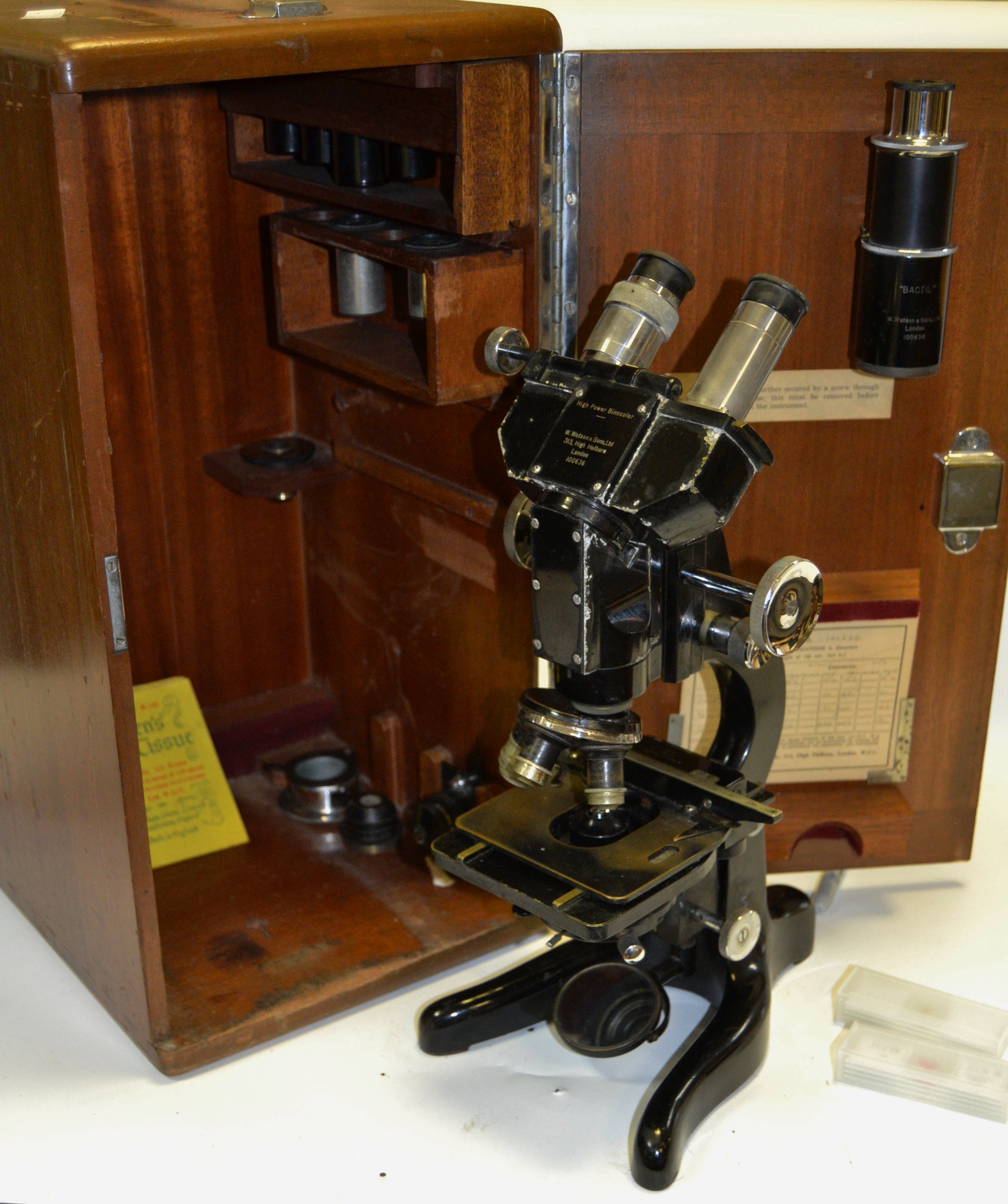 A Watson high power binocular microscope No 100636, manufactured 9th December 1949,