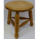 A Derbyshire farmhouse ash milking stool retailed by Chapel House Furniture,