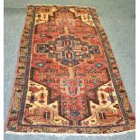 A Hamadan rug, geometric central lozenge,