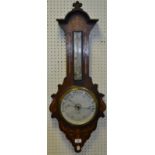 A late 19th century mahogany barometer, the 20cm silvered dial inscribed W.R.